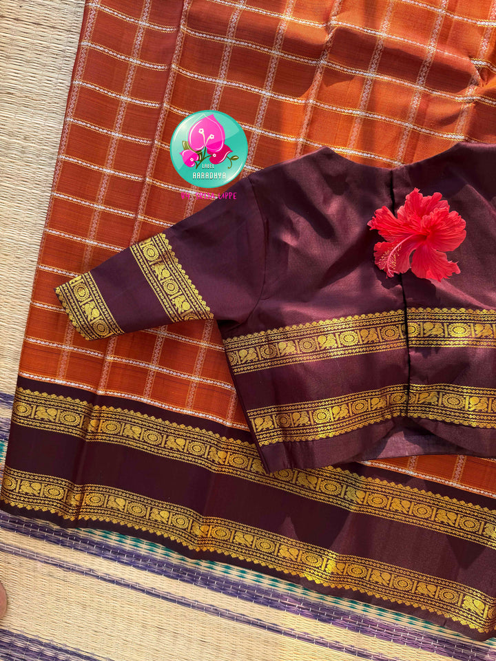 Sovereign Earth: Rust Orange & Dark Brown Kanchipattu Saree with Gandaberunda Artistry