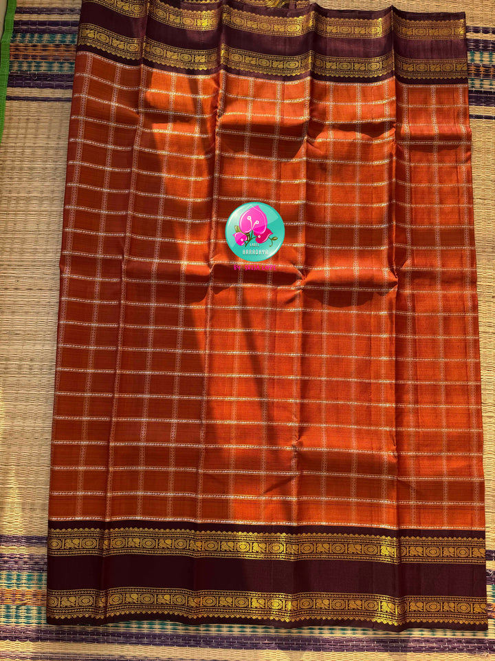 Sovereign Earth: Rust Orange & Dark Brown Kanchipattu Saree with Gandaberunda Artistry