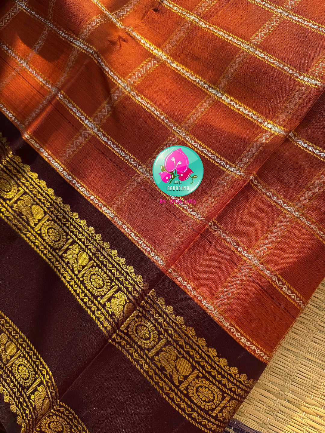 Sovereign Earth: Rust Orange & Dark Brown Kanchipattu Saree with Gandaberunda Artistry