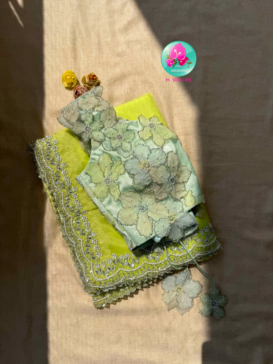Neon Green Organza Saree with Silver Kardana & green palette embroidered Net