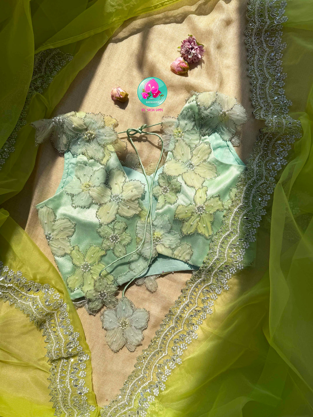 Neon Green Organza Saree with Silver Kardana & green palette embroidered Net