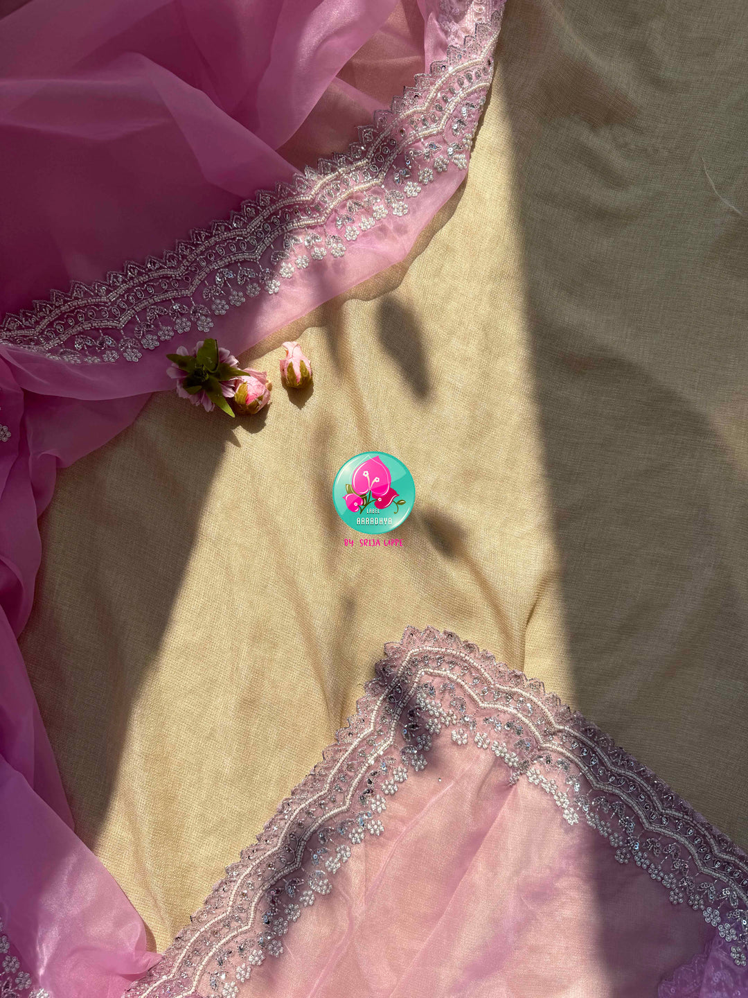 Blushing Starlight: Pastel Pink Organza Saree with Silver Kardana & Kaleidoscopic Net