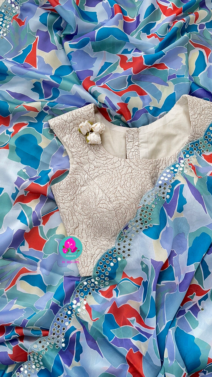 Blue saree with scaloped mirror border