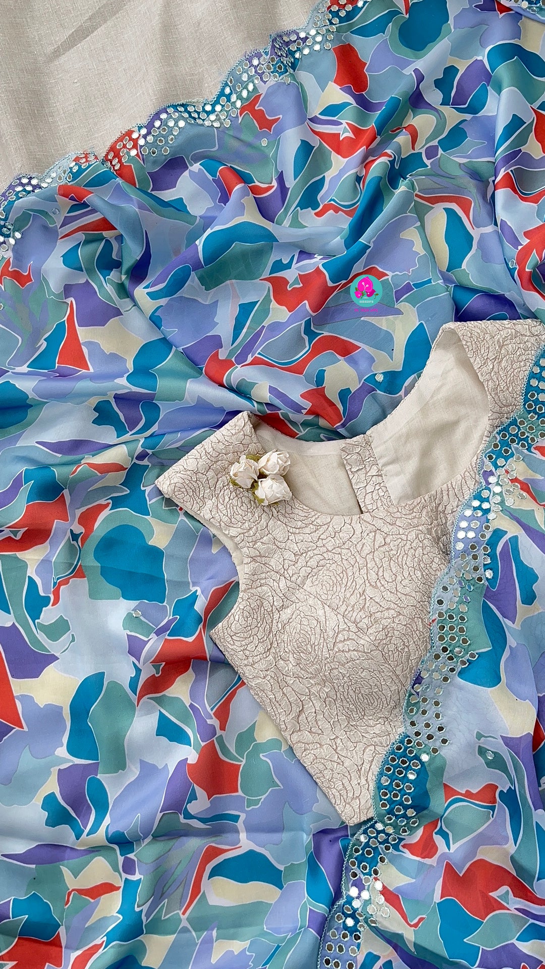 Blue saree with scaloped mirror border