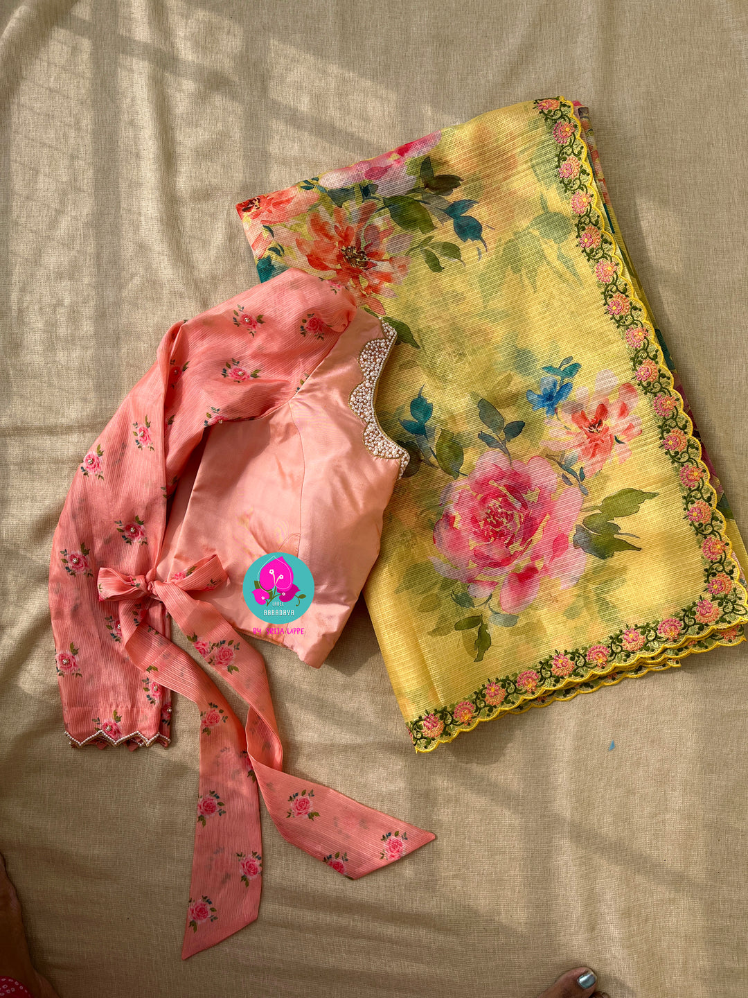 Premium quality yellow kota floral saree with hand embroidered blouse