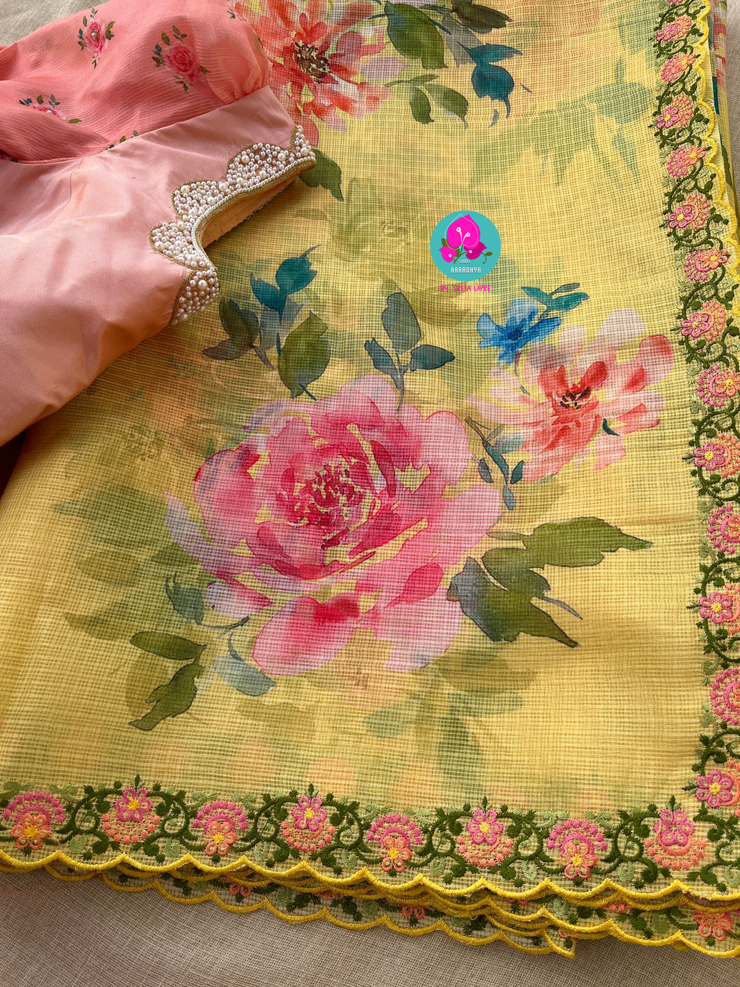 Premium quality yellow kota floral saree with hand embroidered blouse