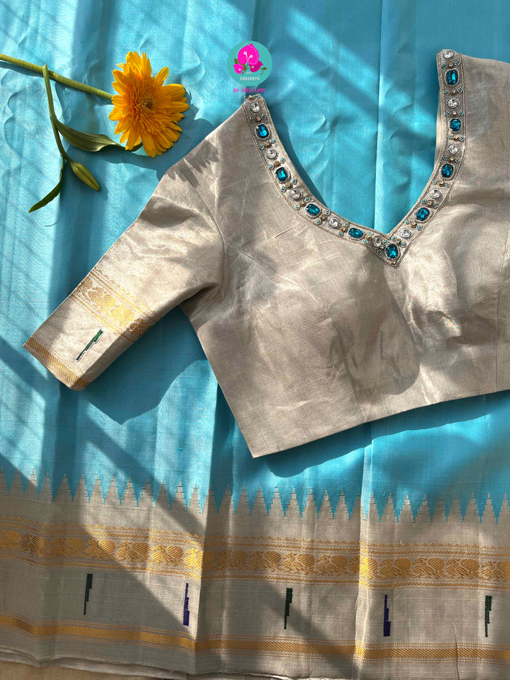 Light Blue Tissue Gadwal muniya border saree with Hand-Embellished Party Wear Detail