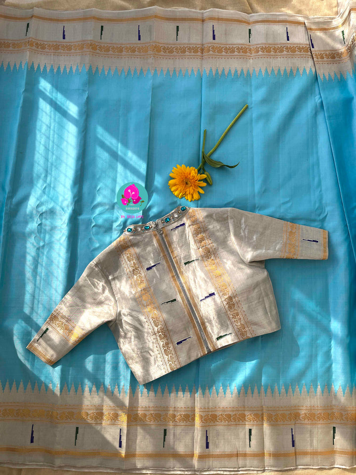 Light Blue Tissue Gadwal muniya border saree with Hand-Embellished Party Wear Detail