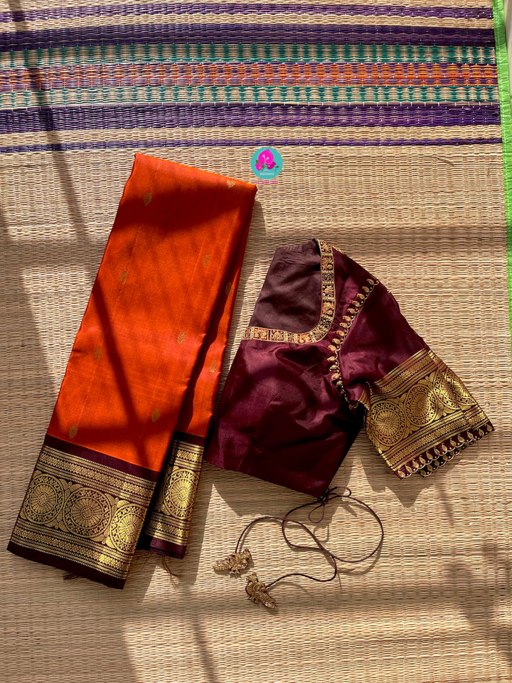 Pure Kanchipattu saree in vintage rust orange and brown border with hand embroidered blouse