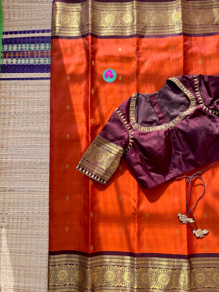 Pure Kanchipattu saree in vintage rust orange and brown border with hand embroidered blouse