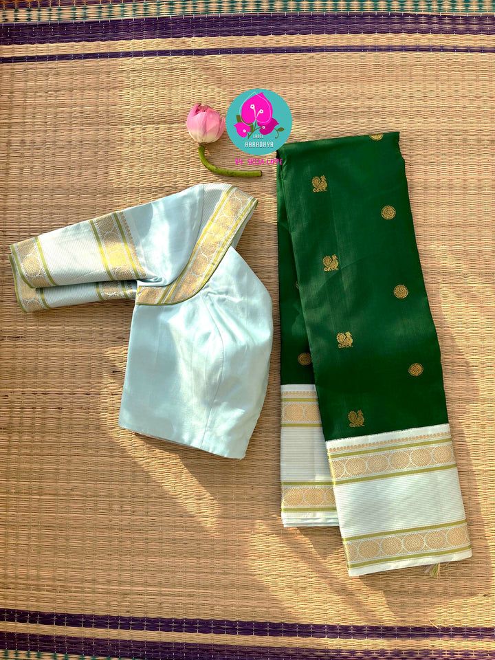 Forest Frost & Vintage Charm: Bottle Green Kanjivaram with Rare Ice Blue Border