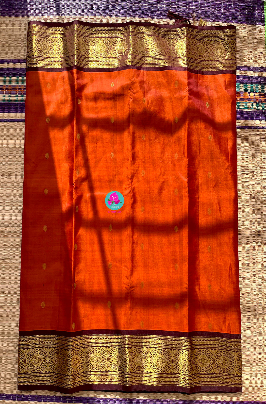 Pure Kanchipattu saree in vintage rust orange and brown border with hand embroidered blouse