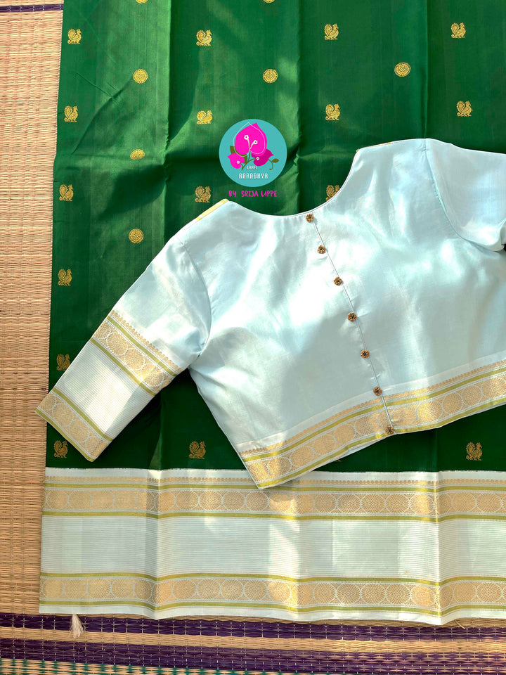 Forest Frost & Vintage Charm: Bottle Green Kanjivaram with Rare Ice Blue Border