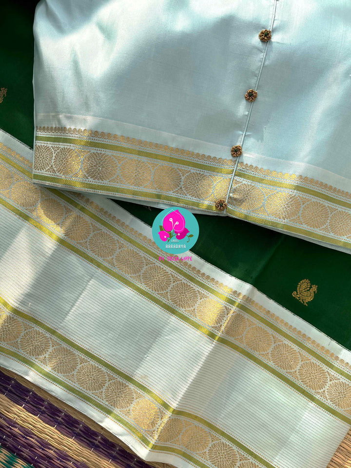 Forest Frost & Vintage Charm: Bottle Green Kanjivaram with Rare Ice Blue Border