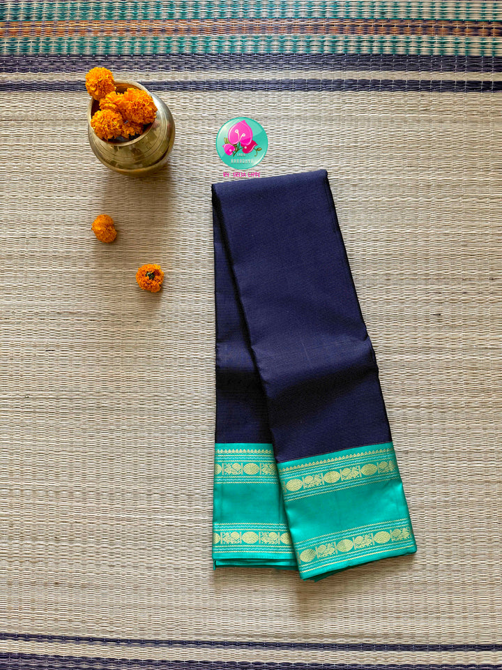 Midnight Currents: Dark Blue Vaira Oosi Kanchipattu Saree with Sea Green Border