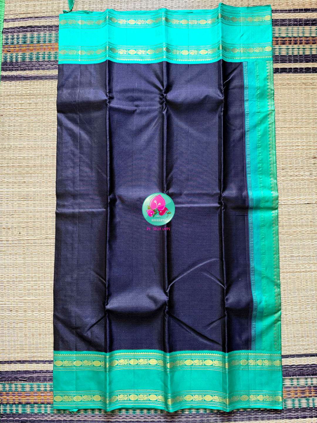 Midnight Currents: Dark Blue Vaira Oosi Kanchipattu Saree with Sea Green Border