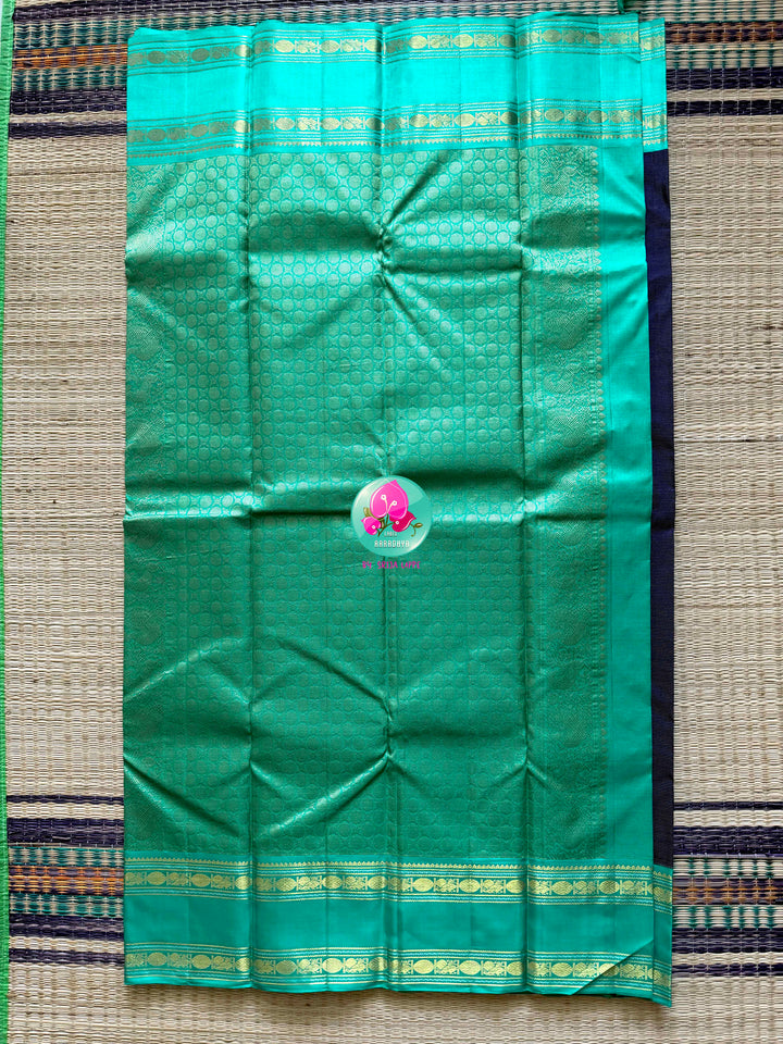 Midnight Currents: Dark Blue Vaira Oosi Kanchipattu Saree with Sea Green Border