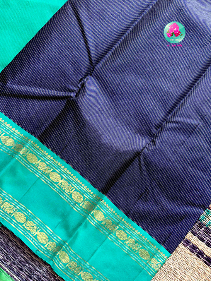 Midnight Currents: Dark Blue Vaira Oosi Kanchipattu Saree with Sea Green Border
