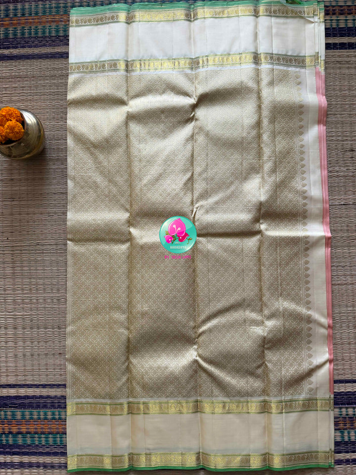 Peach Nectar: Pure 2g Kanchipattu Saree with Off-White Gap Border