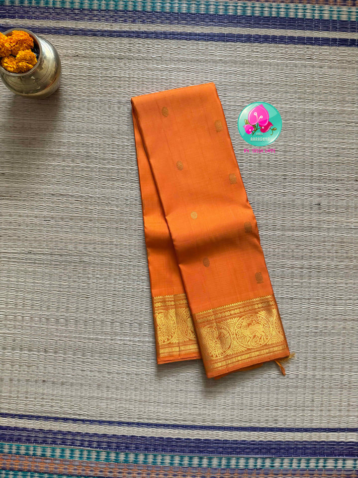 Saffron Radiance: Pure Orange 2g Kanchipattu Saree with Traditional Grandeur