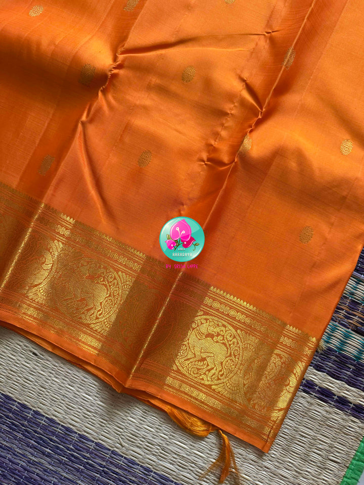 Saffron Radiance: Pure Orange 2g Kanchipattu Saree with Traditional Grandeur