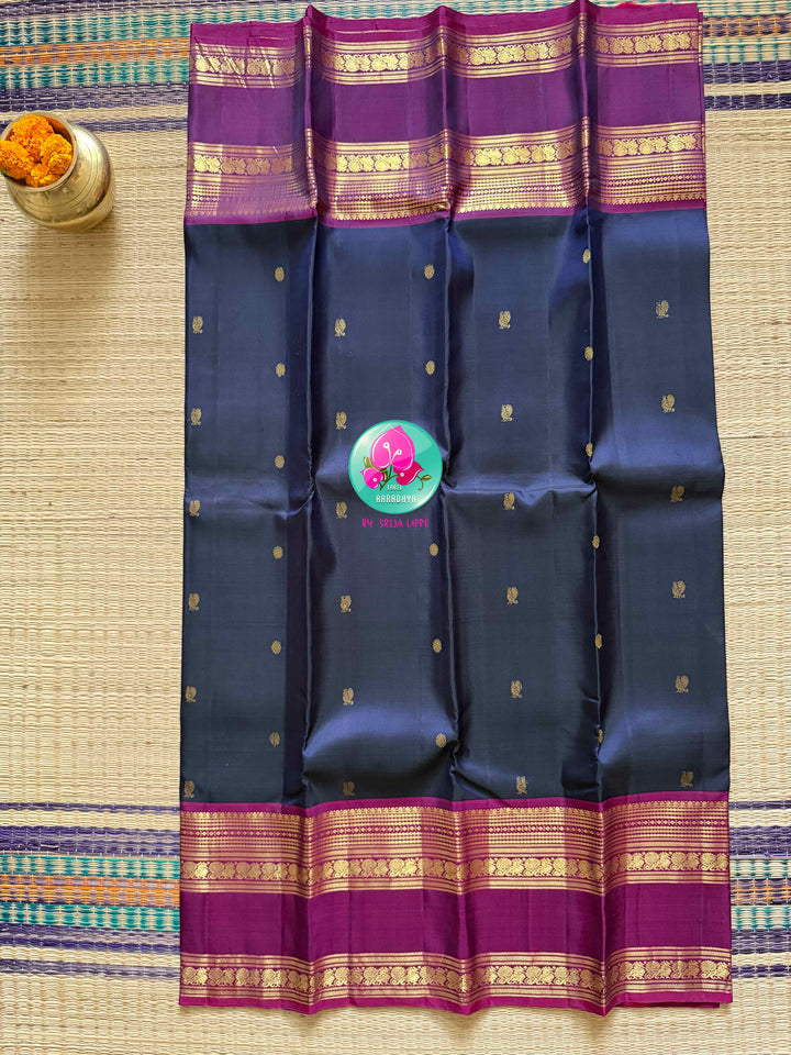Midnight Anchor: Dark Navy Blue Kanchipattu Saree with Crimson Gap Border