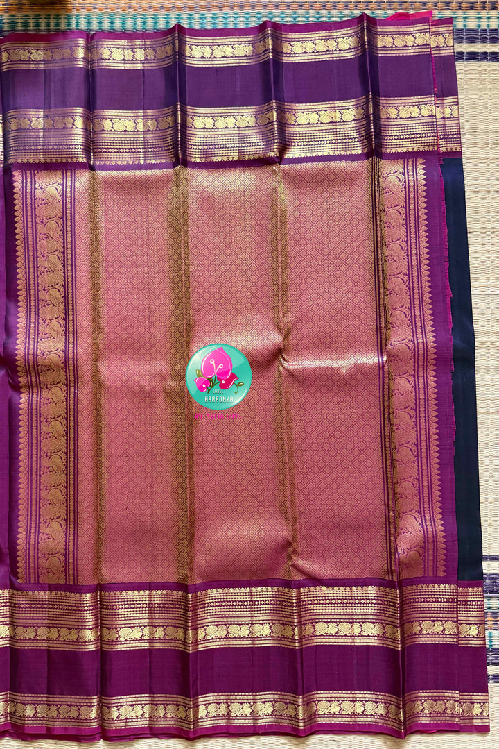 Midnight Anchor: Dark Navy Blue Kanchipattu Saree with Crimson Gap Border