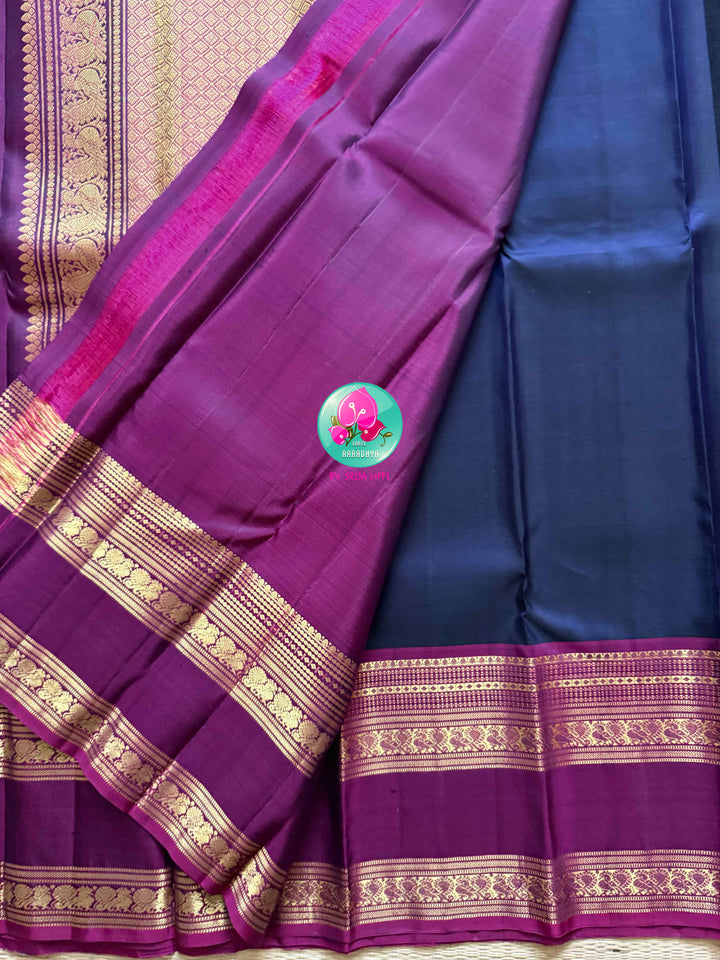 Midnight Anchor: Dark Navy Blue Kanchipattu Saree with Crimson Gap Border