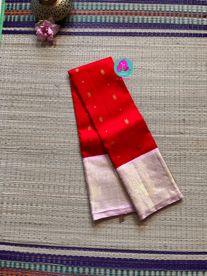 Red and baby pink saree with traditional motif from Kanchipuram