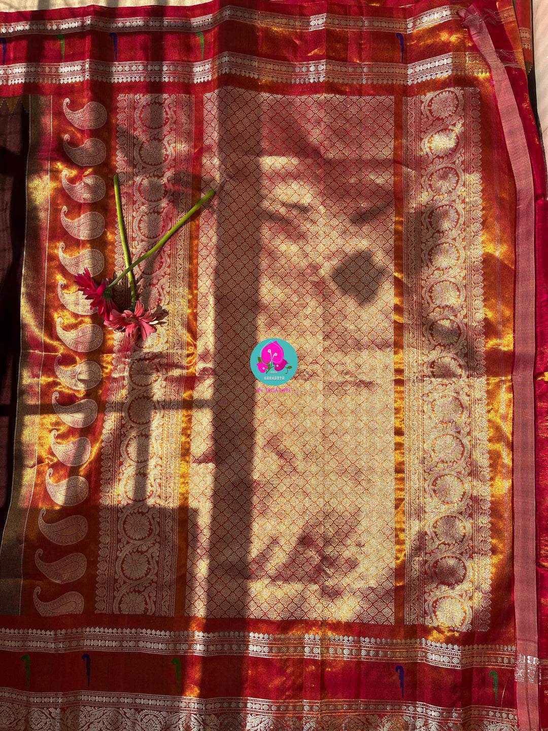 Cocoa Elegance: Deep Brown Tissue Gadwal Saree with Shimmering Orange Muniya Border