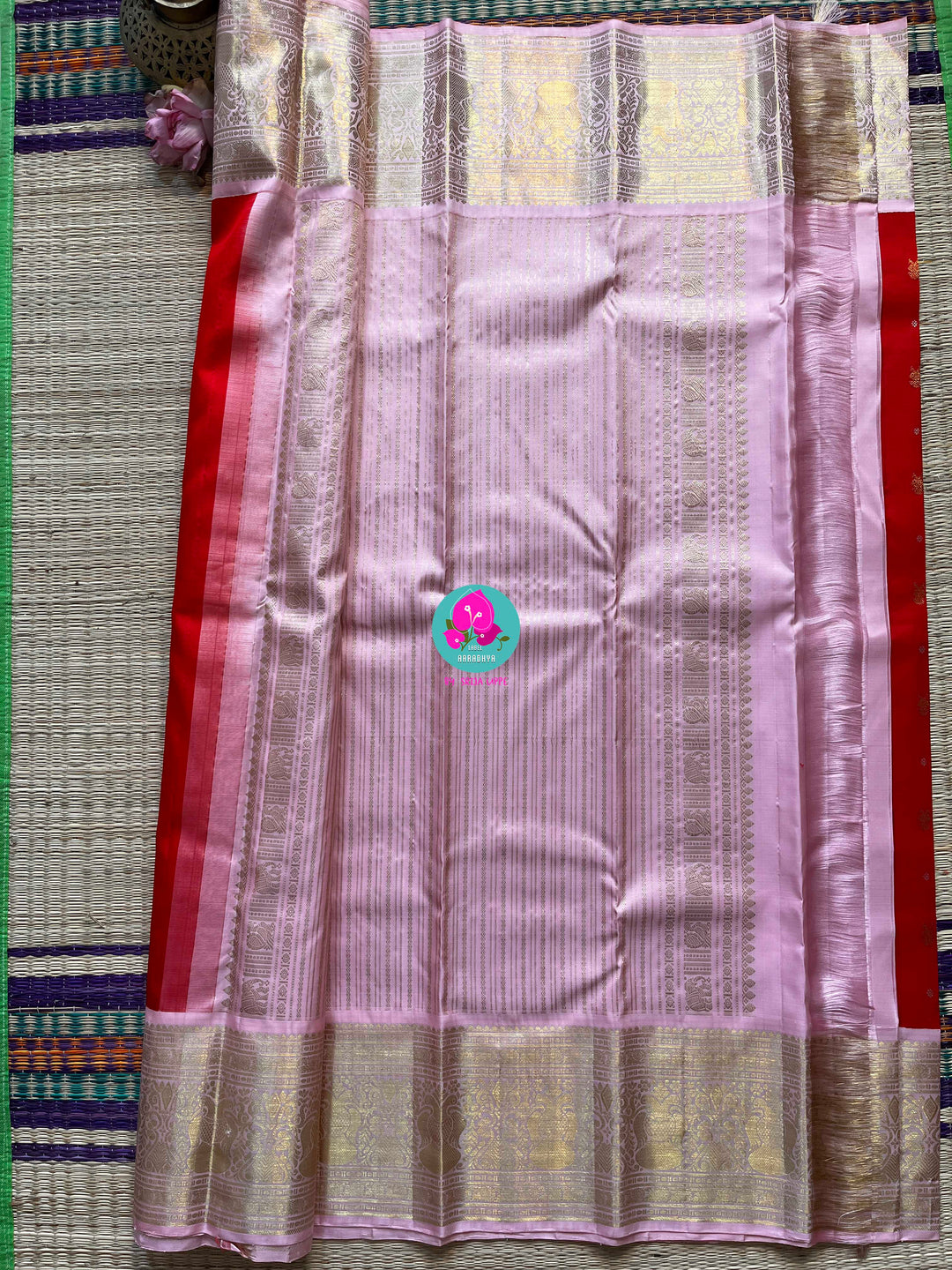 Red and baby pink saree with traditional motif from Kanchipuram