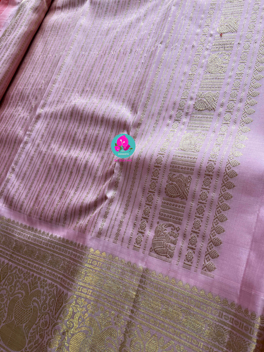 Red and baby pink saree with traditional motif from Kanchipuram