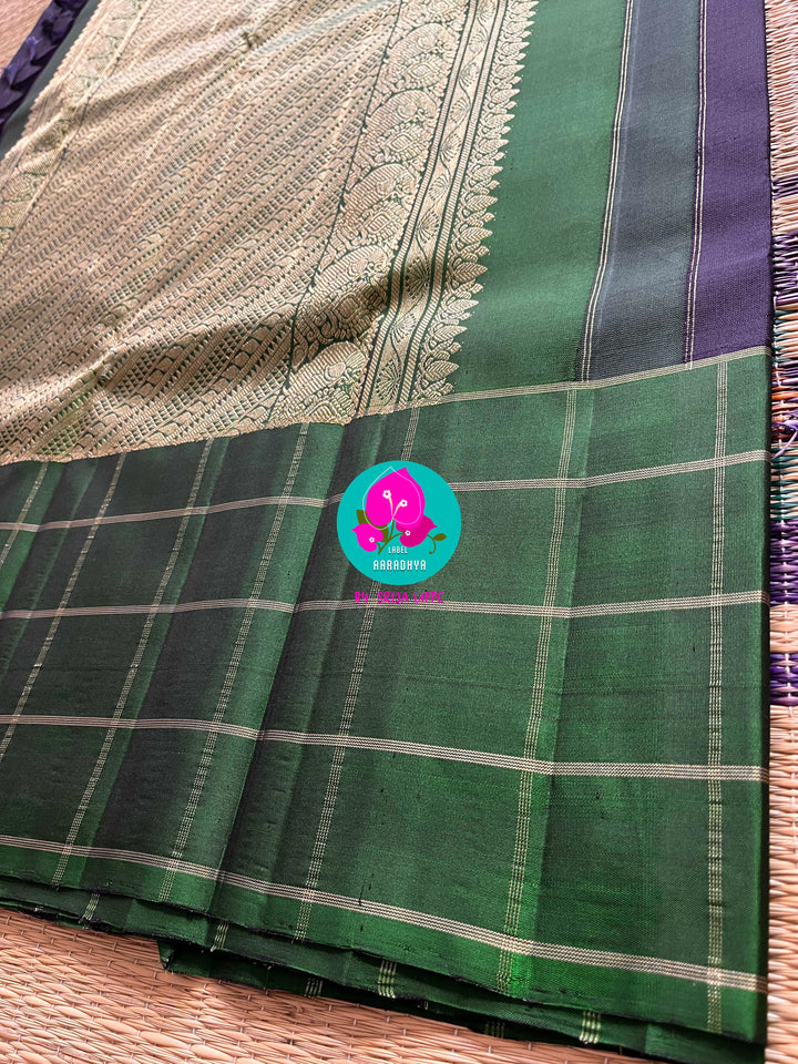 Dark blue saree with vintage checks in green is one of a kind