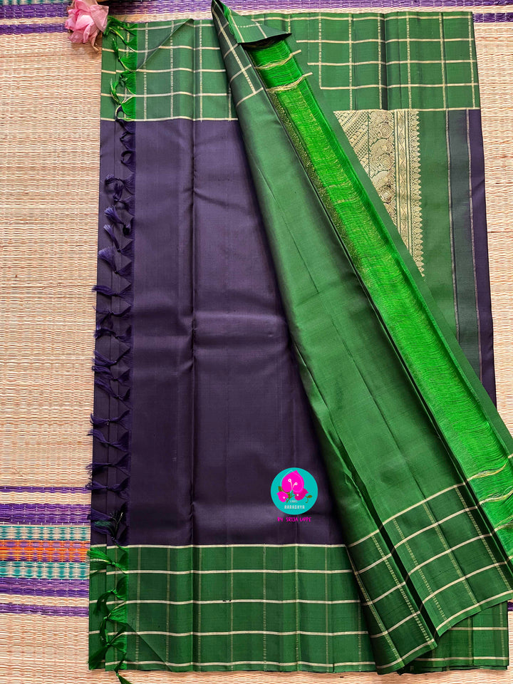 Dark blue saree with vintage checks in green is one of a kind