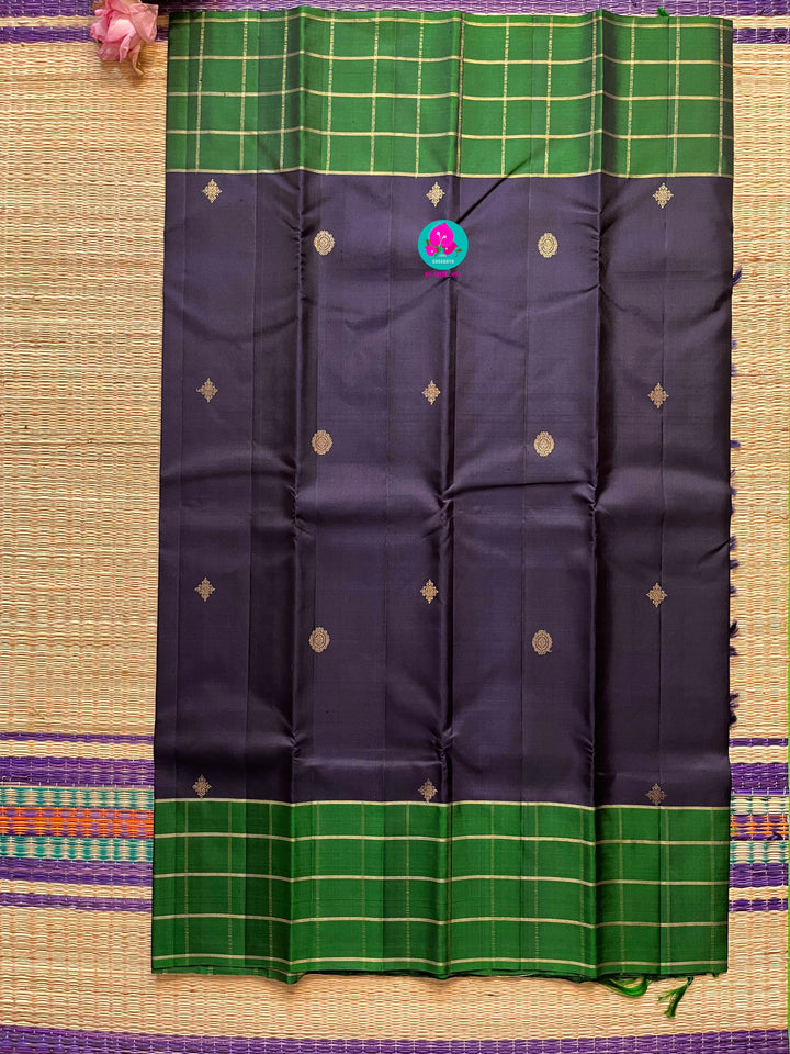 Dark blue saree with vintage checks in green is one of a kind