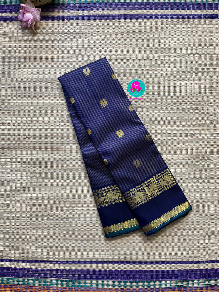 2g zari Vaira Oosi check butta in beautiful shade of blue with gap border