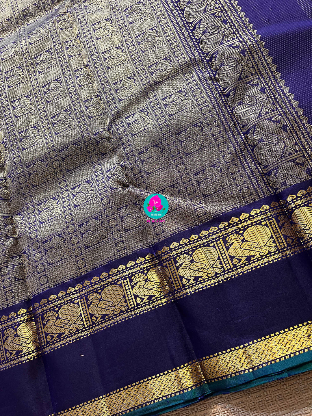 2g zari Vaira Oosi check butta in beautiful shade of blue with gap border