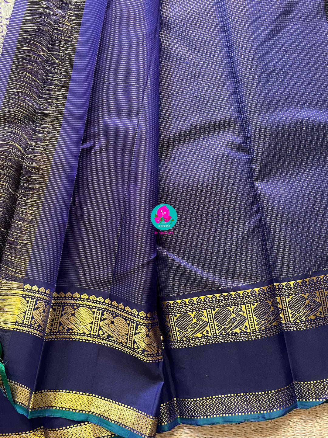 2g zari Vaira Oosi check butta in beautiful shade of blue with gap border