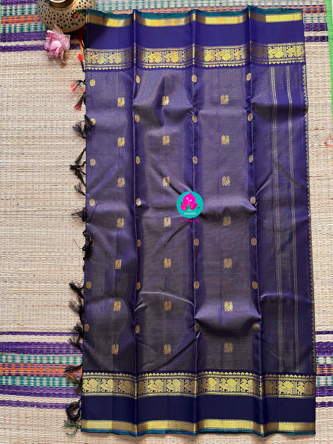 2g zari Vaira Oosi check butta in beautiful shade of blue with gap border