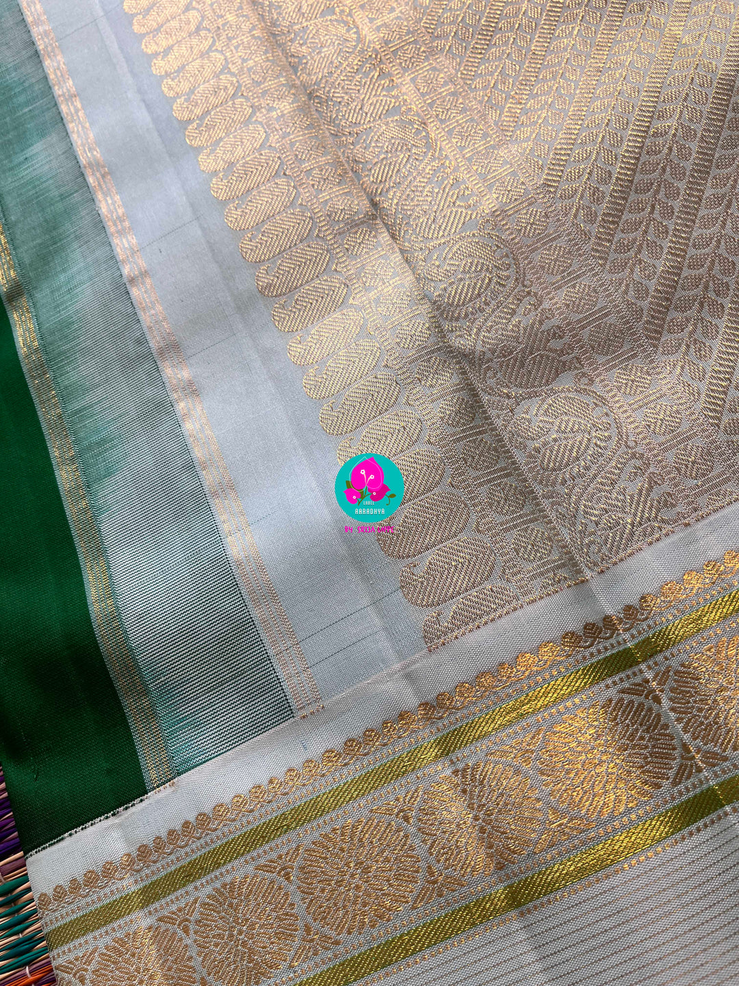 Bottle green vintage saree with ice blue border is one of a kind