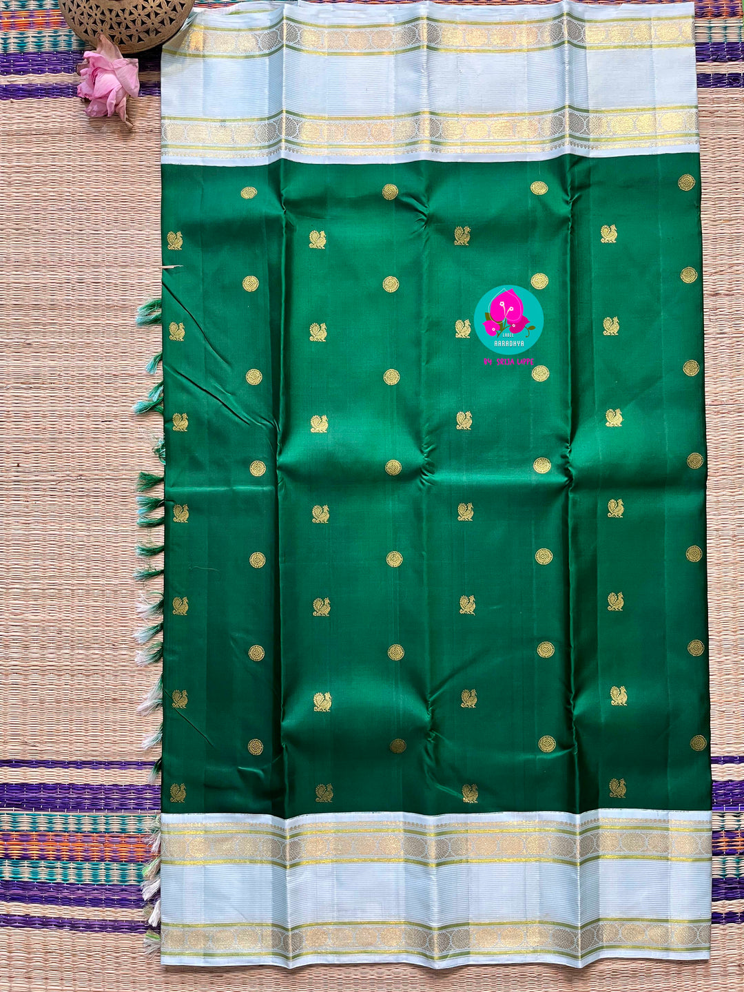 Bottle green vintage saree with ice blue border is one of a kind