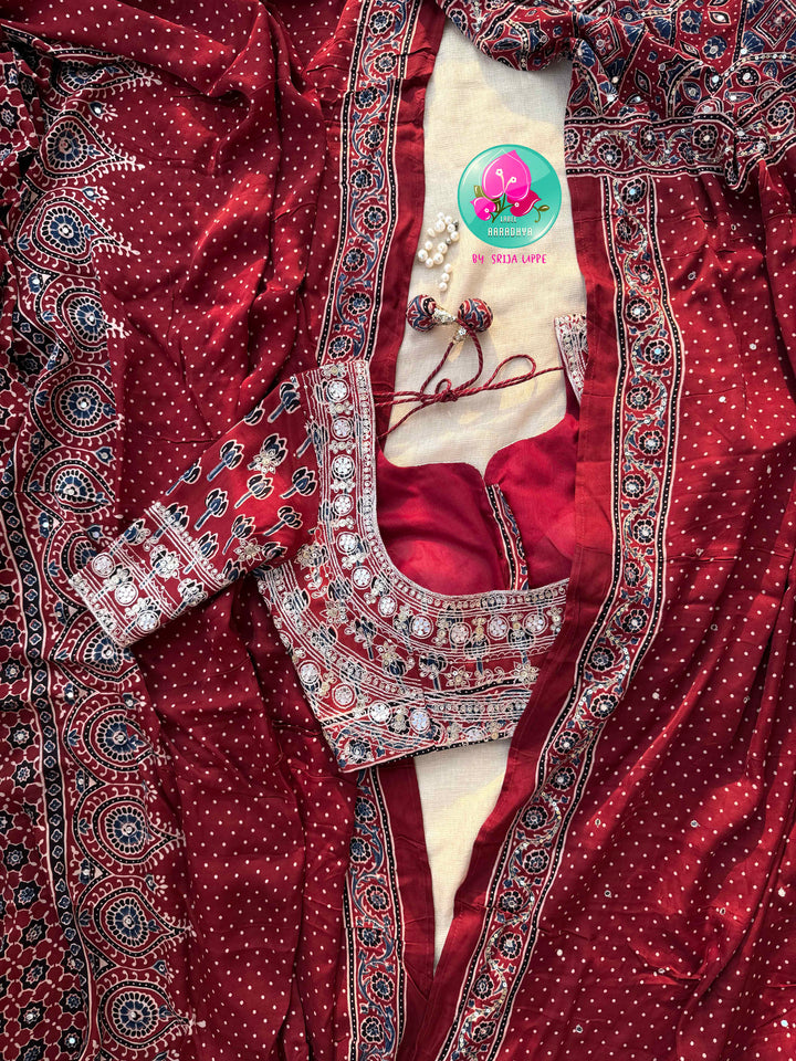Crimson Geometry & Desert Shimmer: Pure Modal Silk Ajrakh Saree with Hand-Worked Artistry