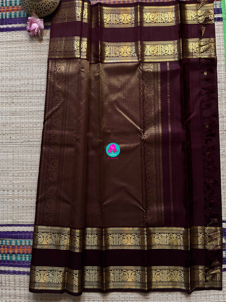 Kanchipuram 2g zari brown vintage saree with gap border