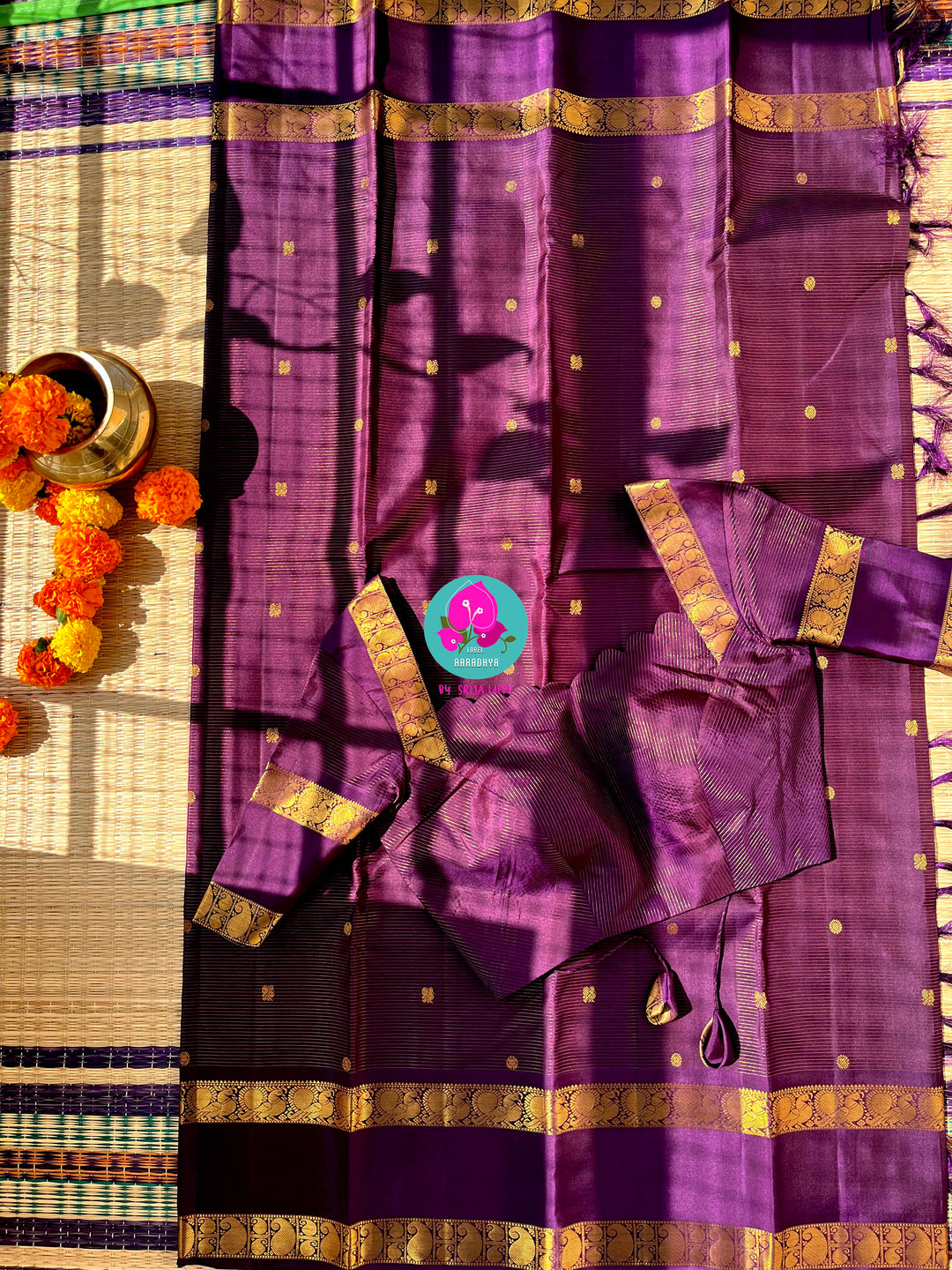 Vaira oosi pure Kanchipattu gap border with peacock motifs in purple paired with blouse