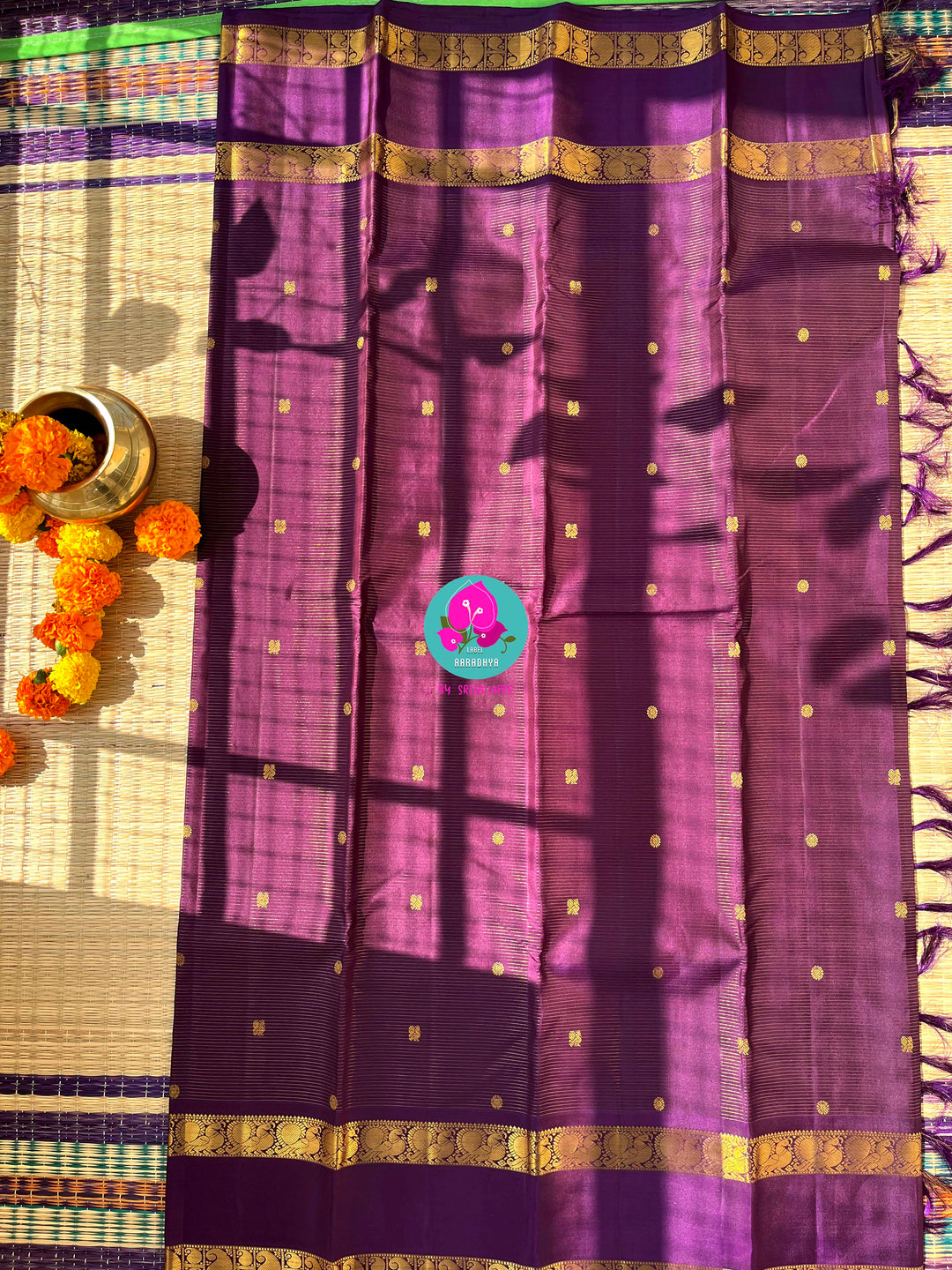 Vaira oosi pure Kanchipattu gap border with peacock motifs in purple paired with blouse