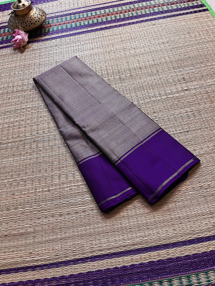 Purple blue with vintage Zari lines all over is one of a kind