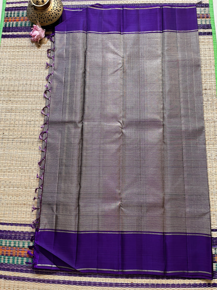 Purple blue with vintage Zari lines all over is one of a kind