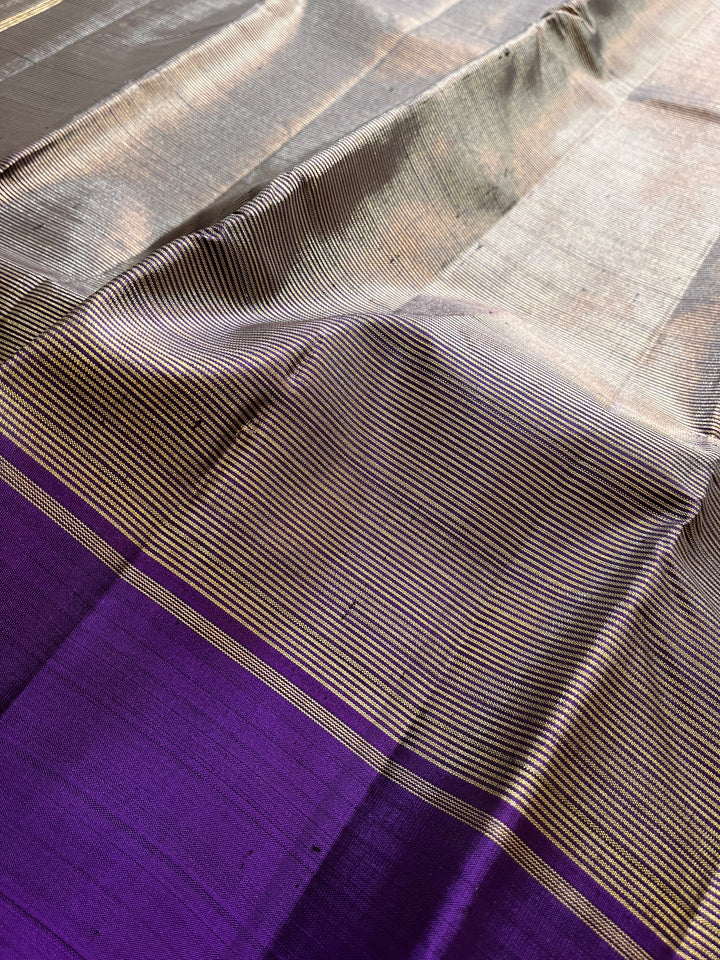 Purple blue with vintage Zari lines all over is one of a kind