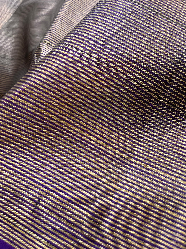 Purple blue with vintage Zari lines all over is one of a kind