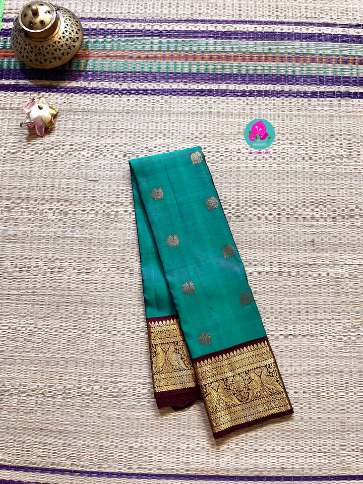 Peacock Blue with brown border